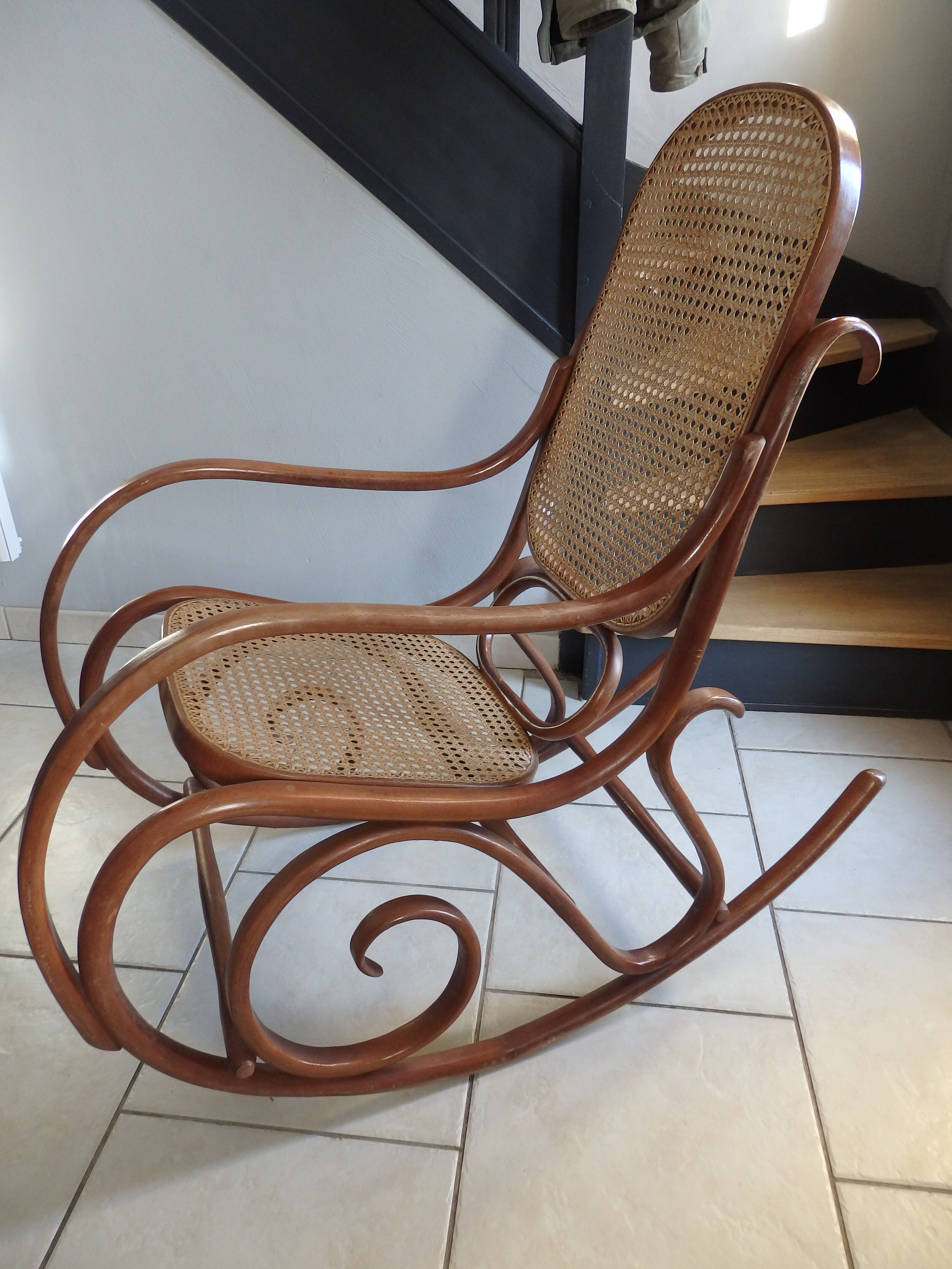 Rocking-chair in turned wood and cannage