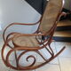 Rocking-chair in turned wood and cannage