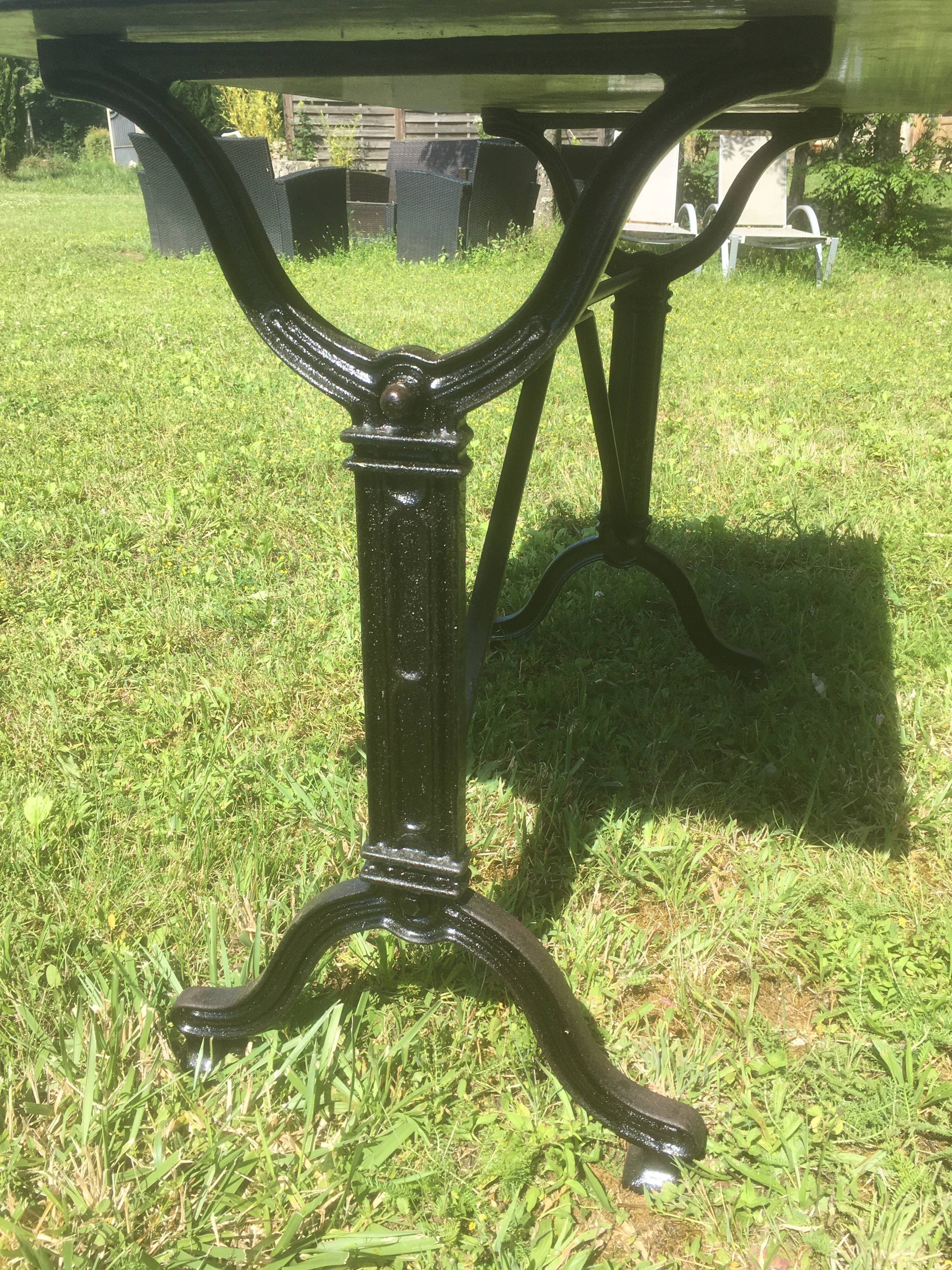 Bistro table with cast iron base