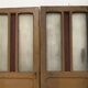 Double glass and patinated fir passage doors, 20th century