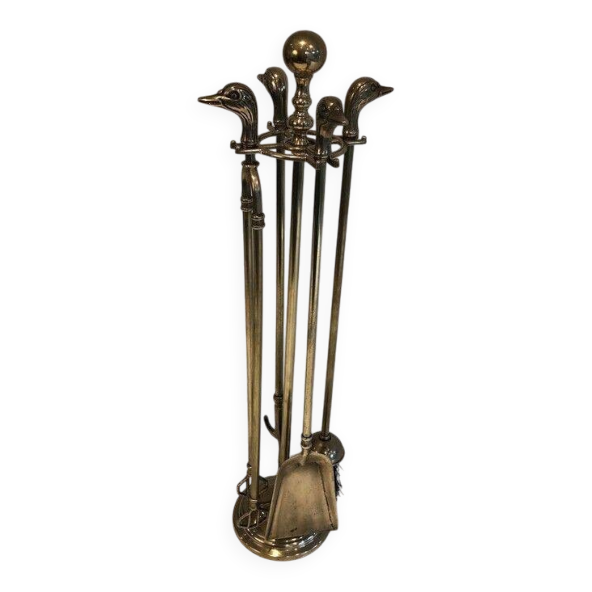 Neoclassical brass fire accessory with duck head decorations.