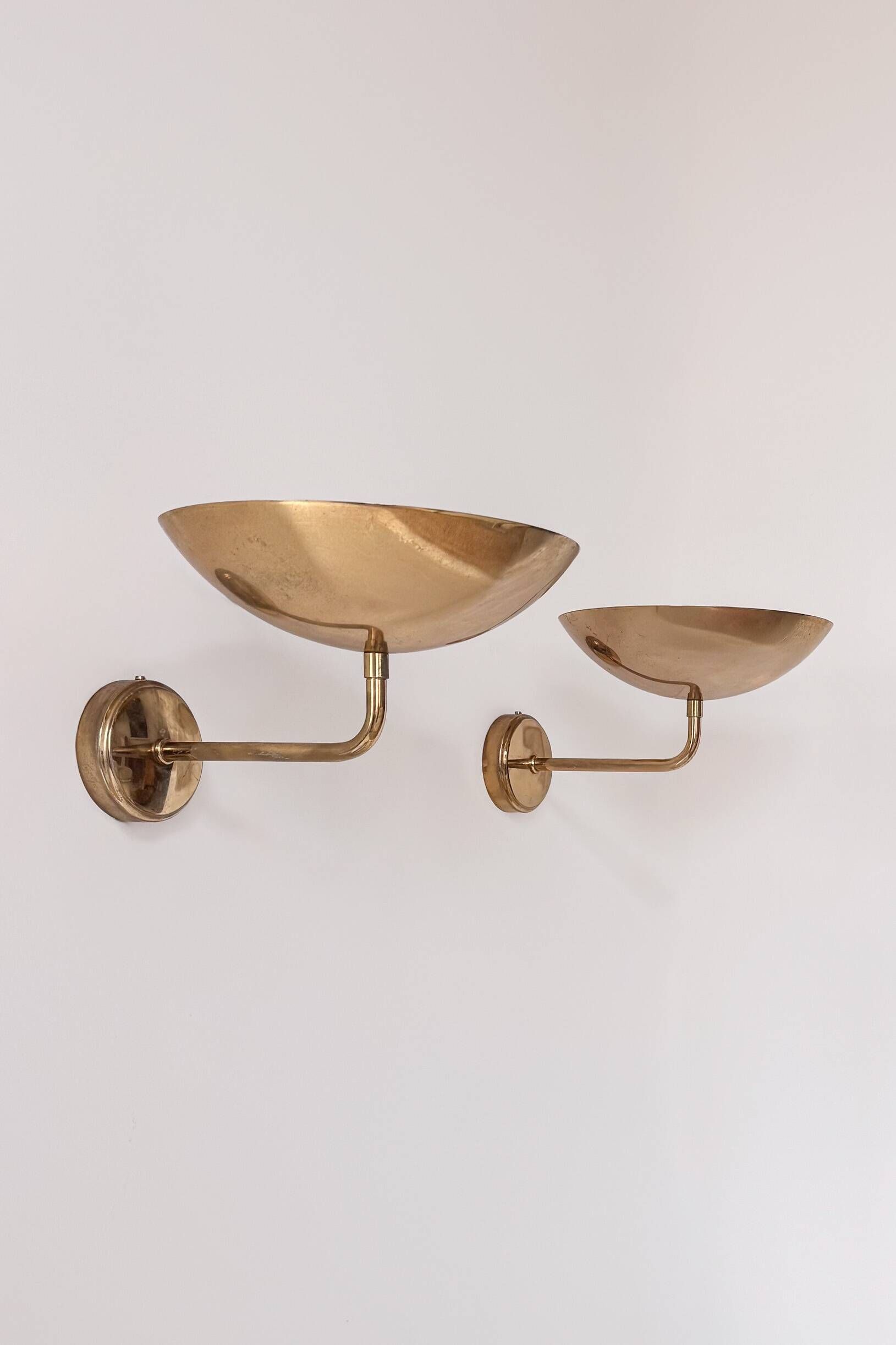 Pair of vintage wall lights, patinated brass, France 1970.