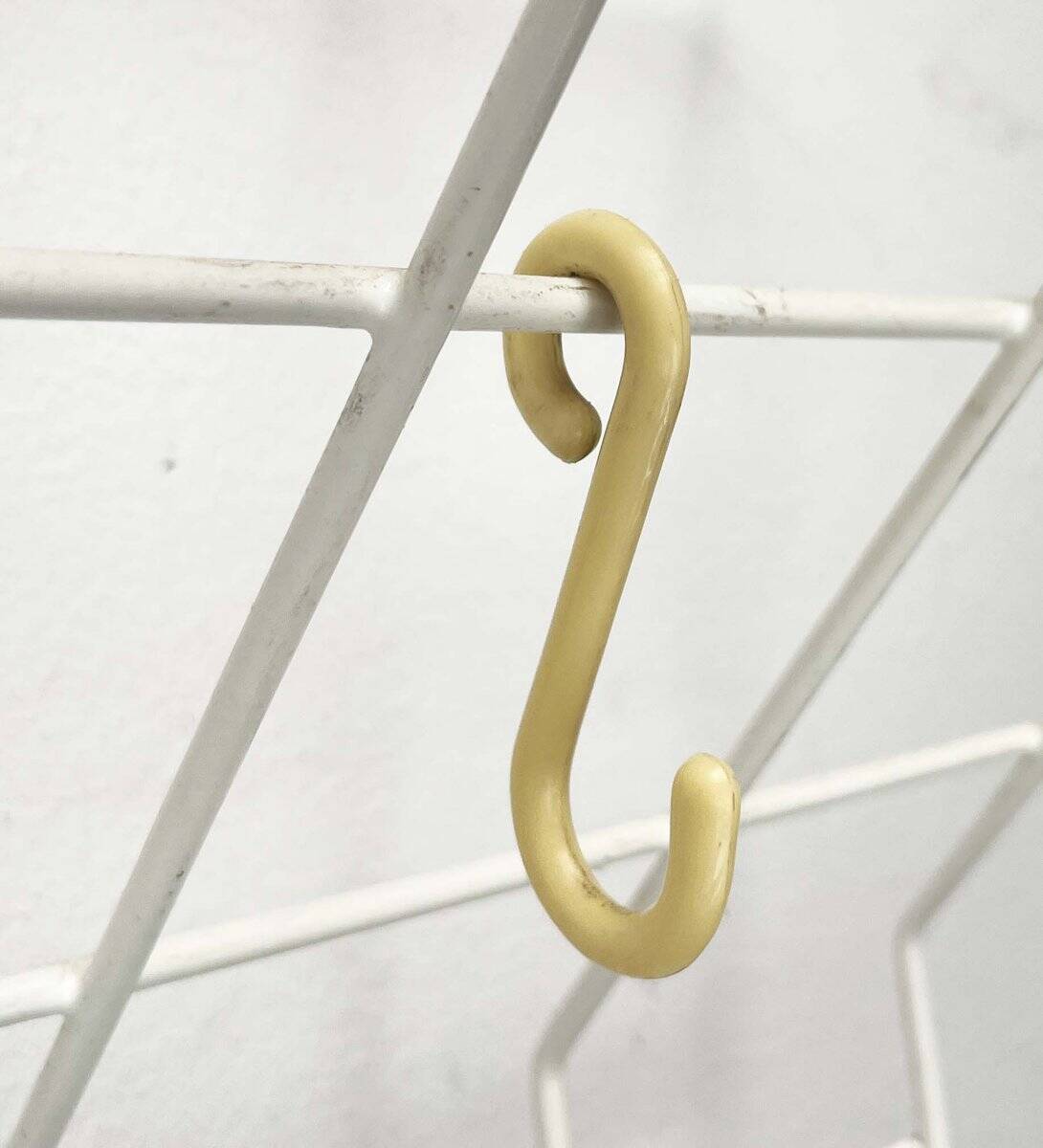 Minimalist white German mid-century coat rack with strings from the 1960s.