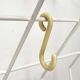 Minimalist white German mid-century coat rack with strings from the 1960s.