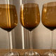 6 amber stemmed glasses