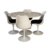 Tulip set round marble table and 4 swivel chairs by Eero Saarinen edited by Knoll