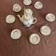 Antique coffee service in longwy porcelain – floral decoration and gilding –