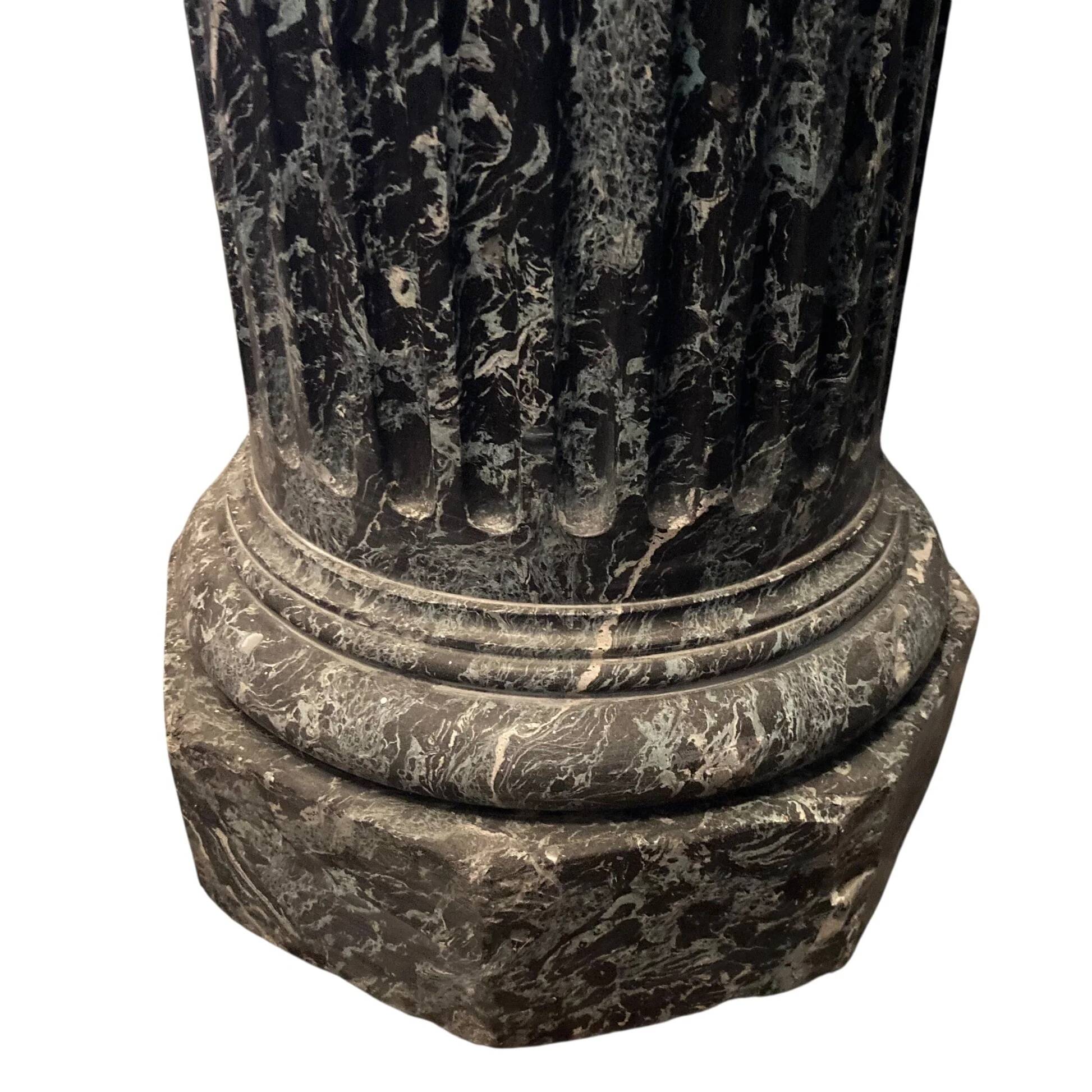 Pair of black and green scagliola columns from the 19th century.