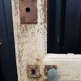 Ancient paneled solid oak door with 3 windows