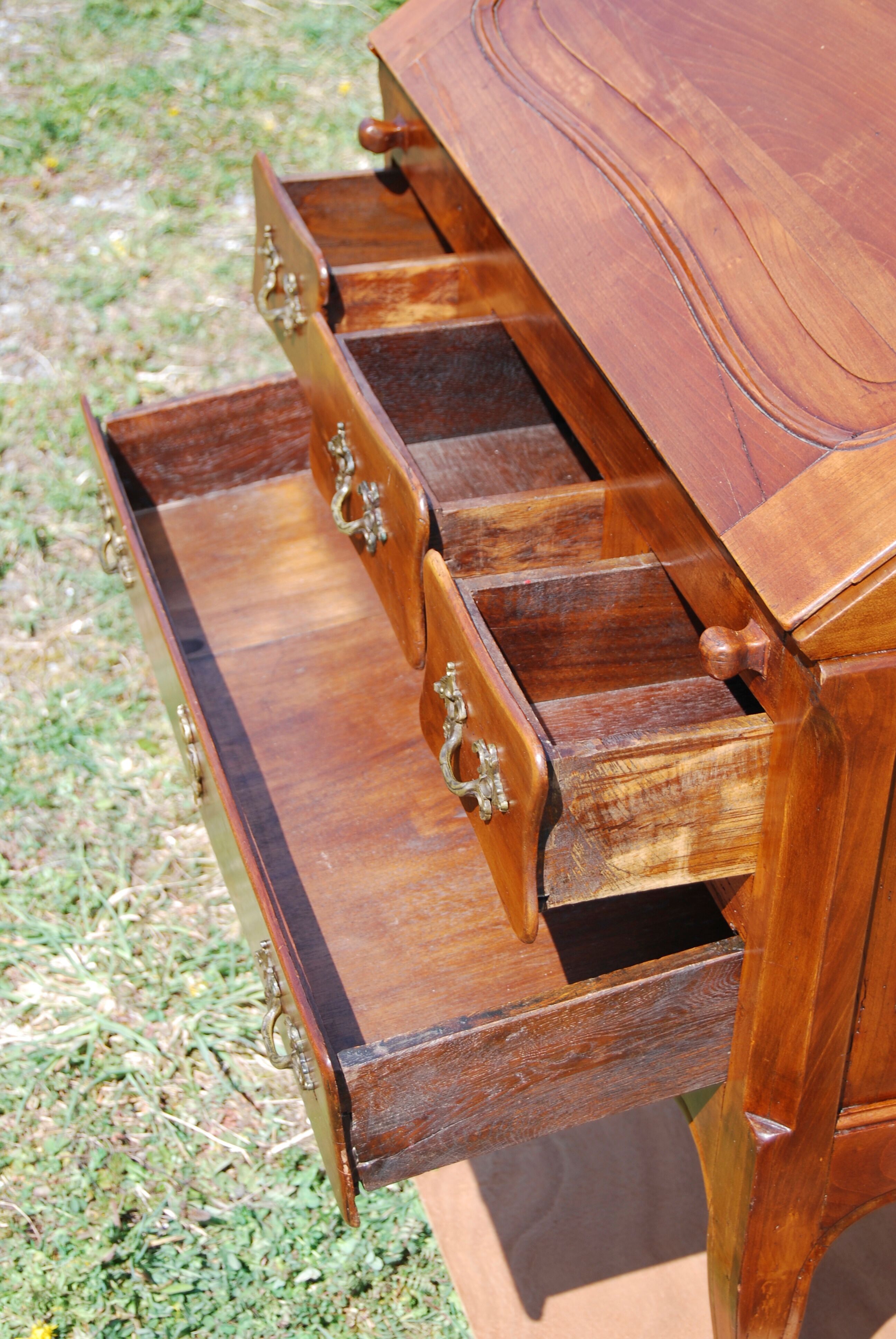 Sloping desk, secretary, donkey back Louis XV walnut.