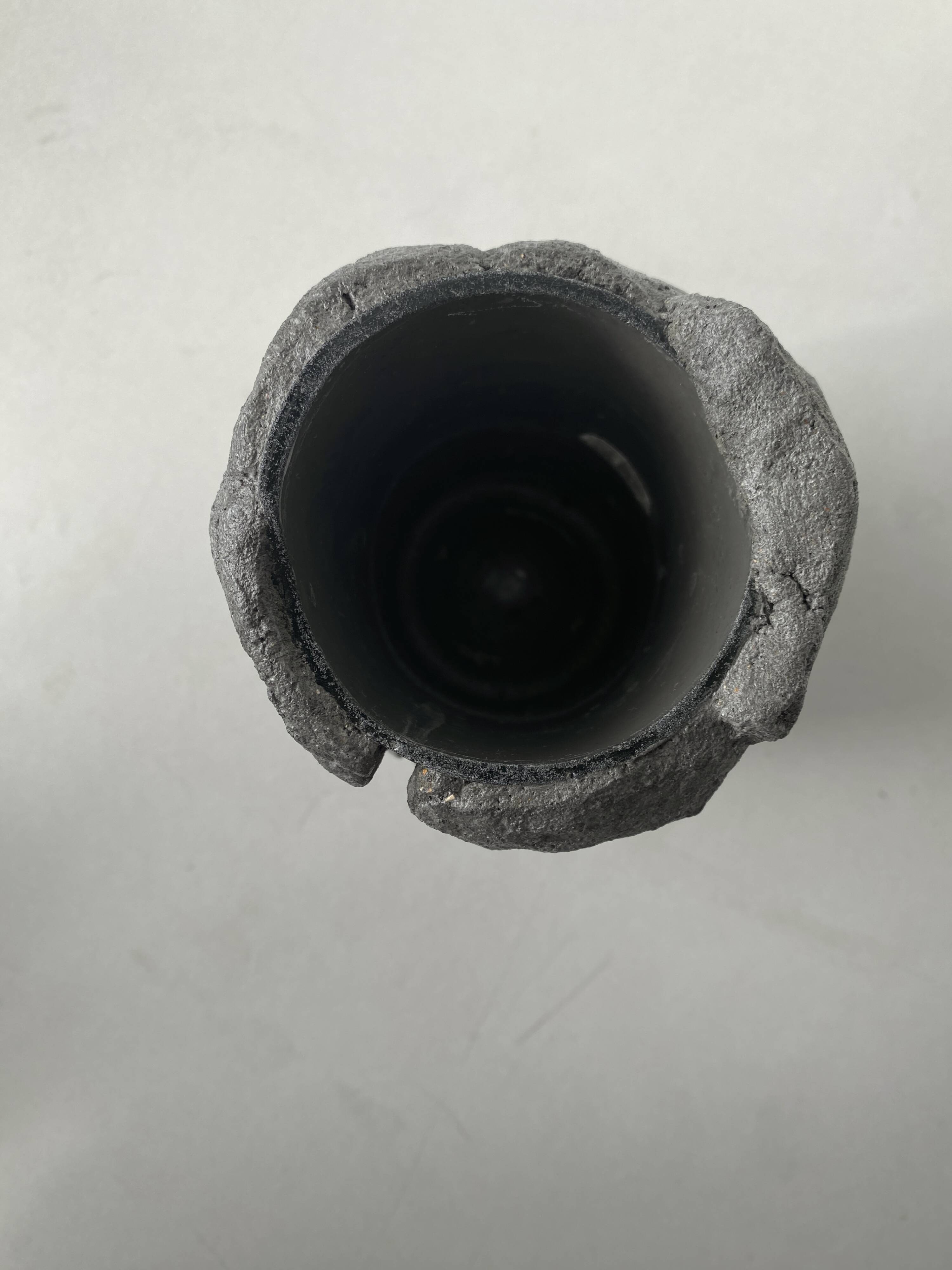 Sculpted concrete vase