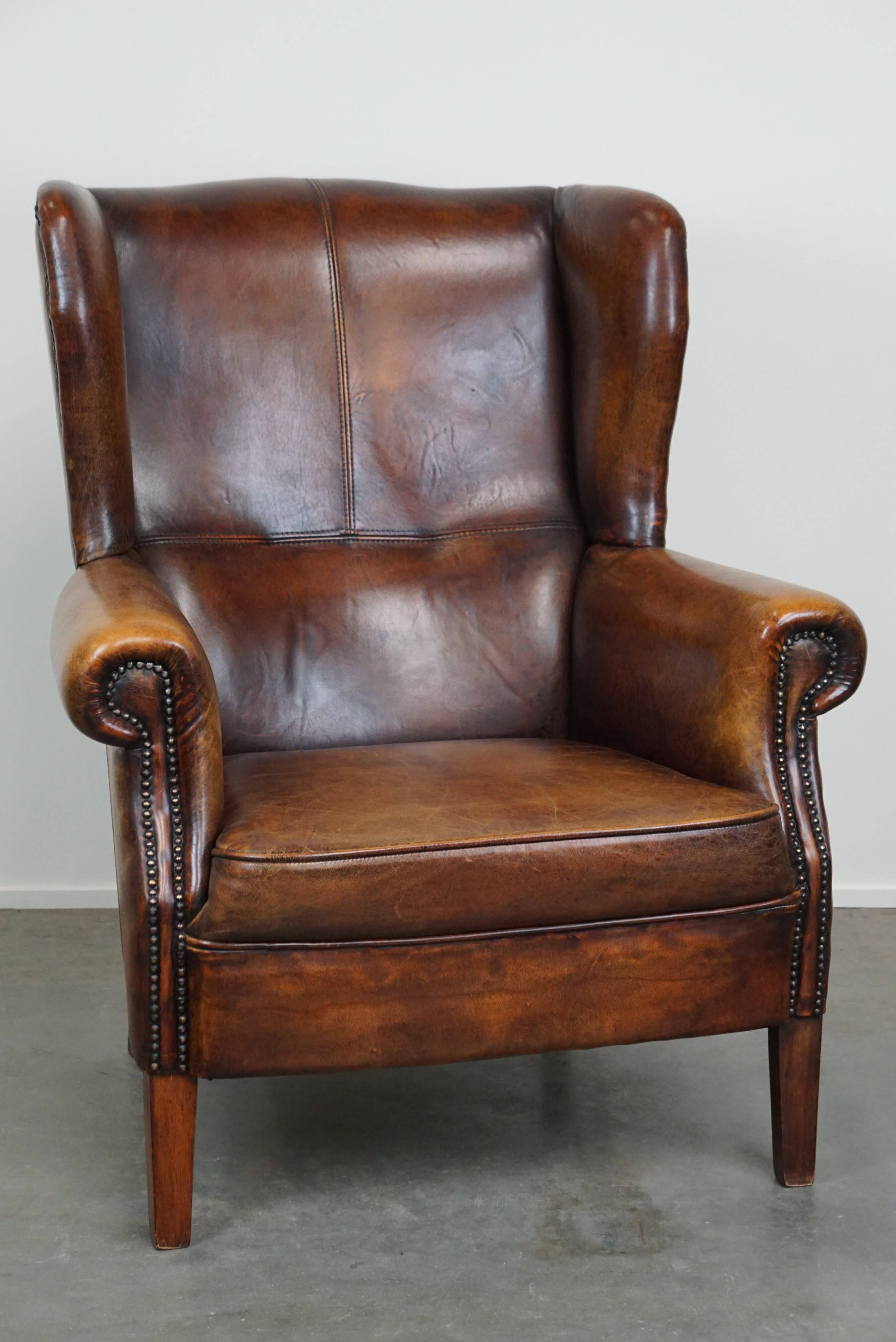 large wingback chair made of sheepskin leather with uniquely beautiful colors