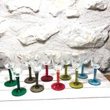 Antique and rare! Sold in a set of 12 colorful twisted stemmed glasses engraved with flowers and leaves