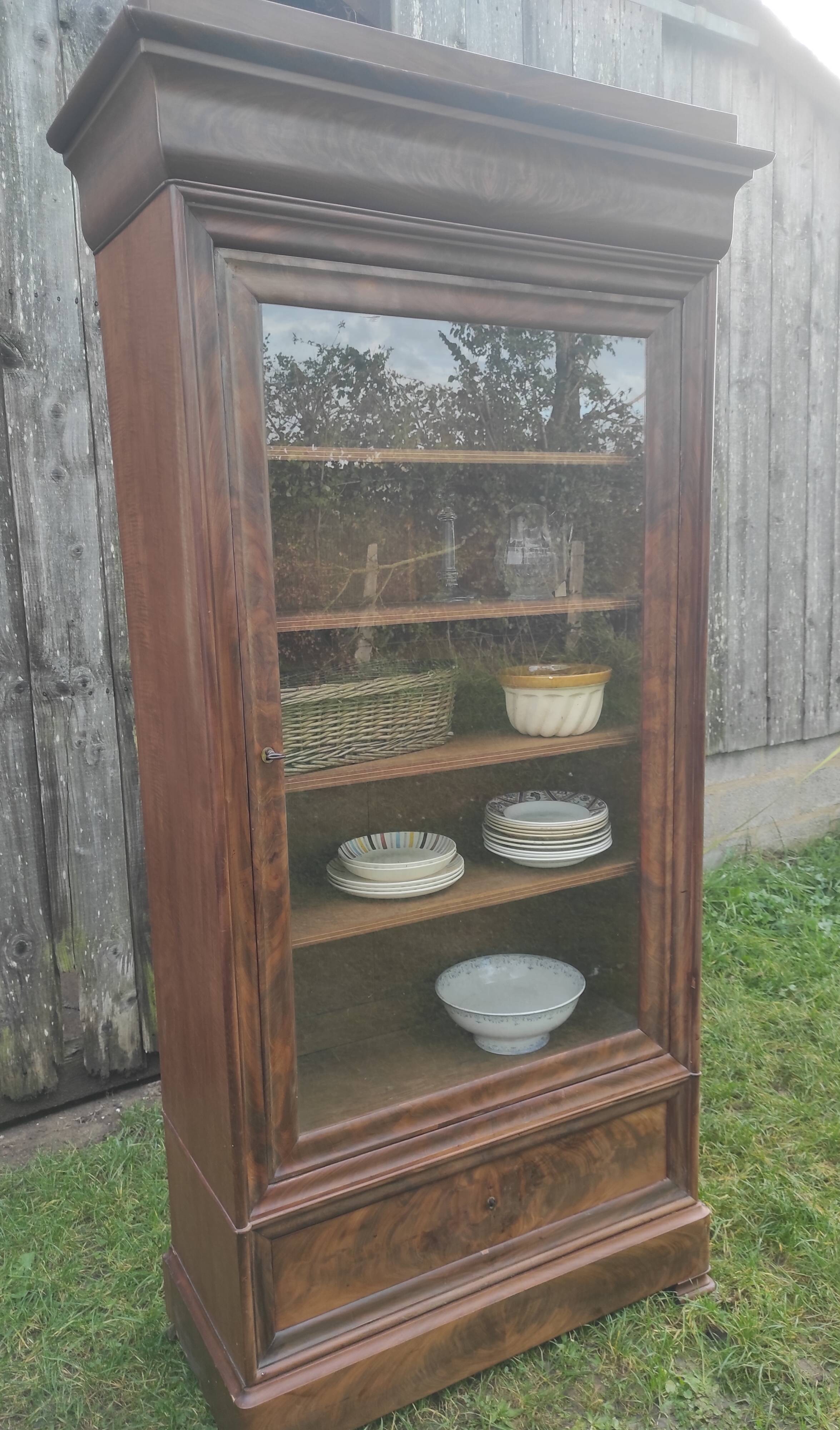 Parisian glass cabinet.