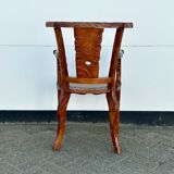 Fauteuil en teck poignardé à la main