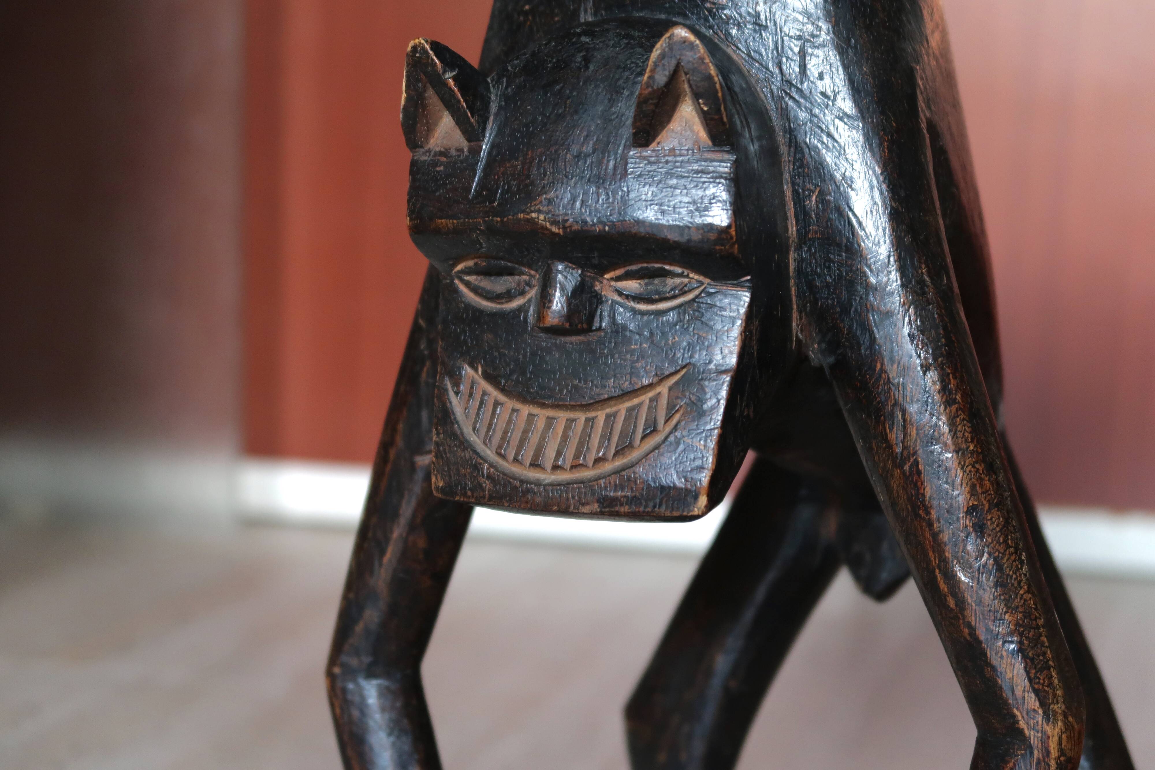 African zoomorphic wooden stool