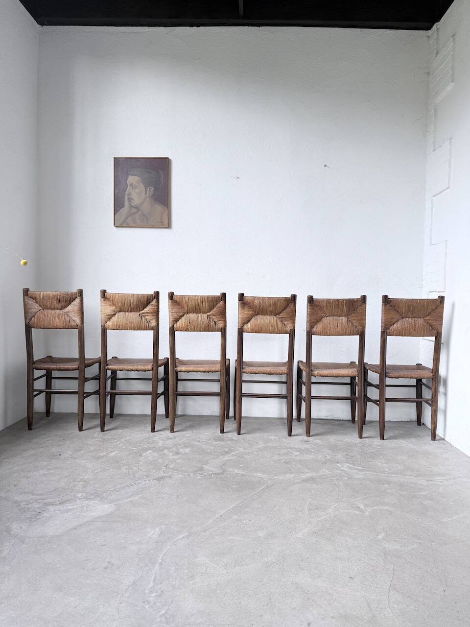 Set of 6 straw and oak Beauche chairs.