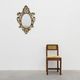 Miroir ovale en métal doré de style rococo, Italie, 20e siècle