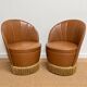Vintage cognac fringe tub chairs