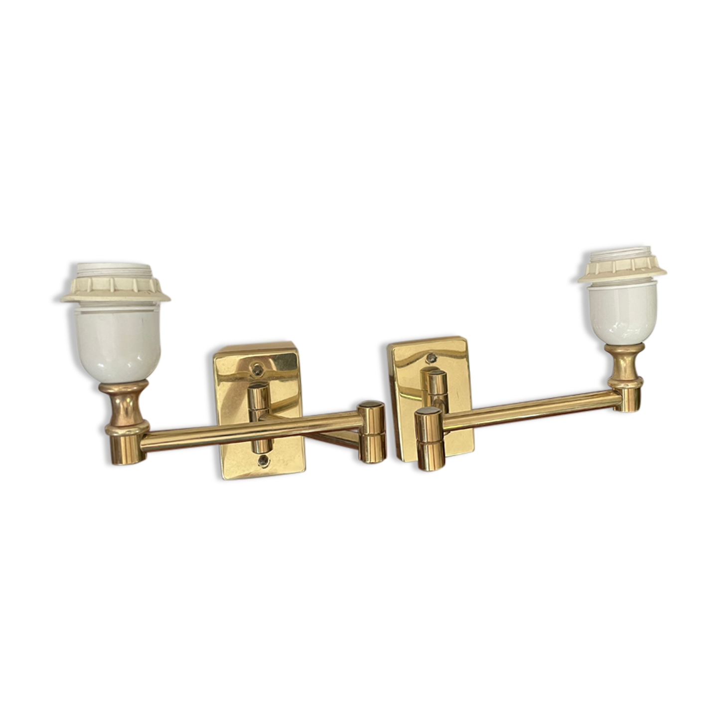 Pairs of brass articulated wall lamps