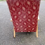 Scandinavian armchair in wood and red fabric