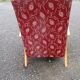Fauteuil scandinave en bois et tissu rouge