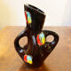 Set of three ceramic pitchers