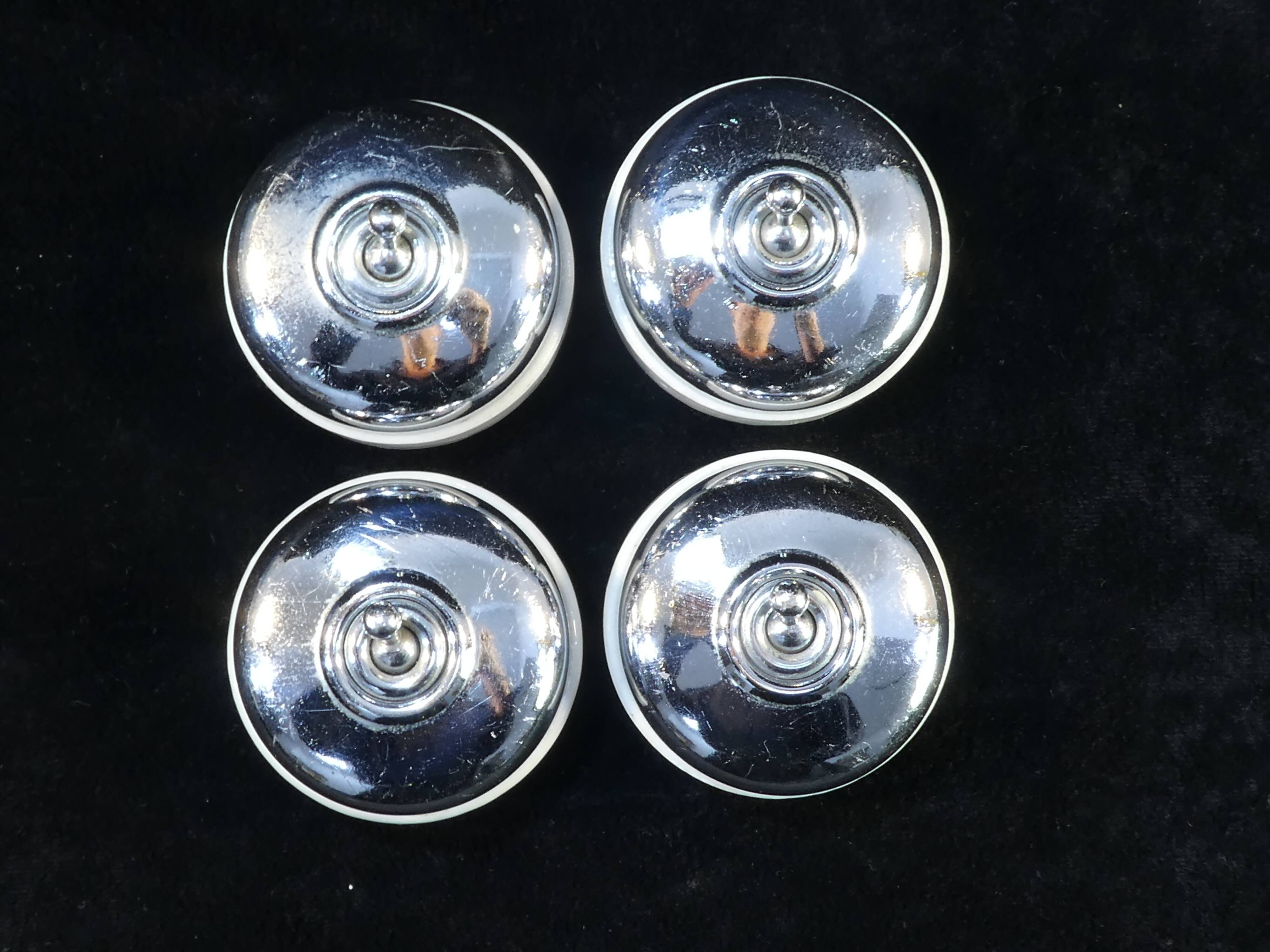 Set of 4 old porcelain and chrome switches