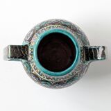 Polychrome ceramic vase in flowing enamel from Nabeul with mihrab decoration.