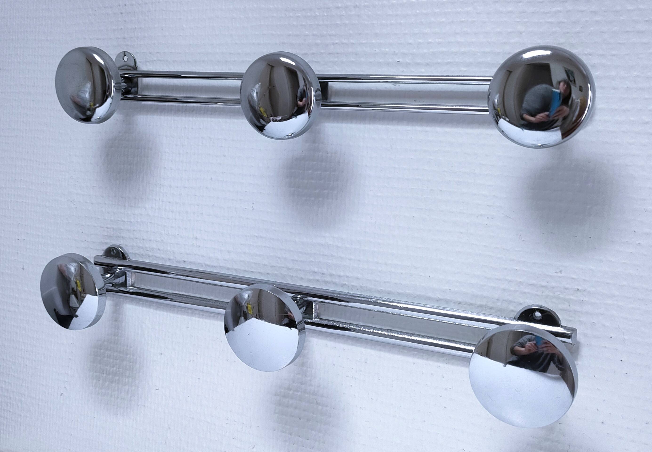 Two vintage chrome metal coat racks