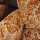 Set of 2 vintage armchairs in floral fabric with fringes from the 60s 70s