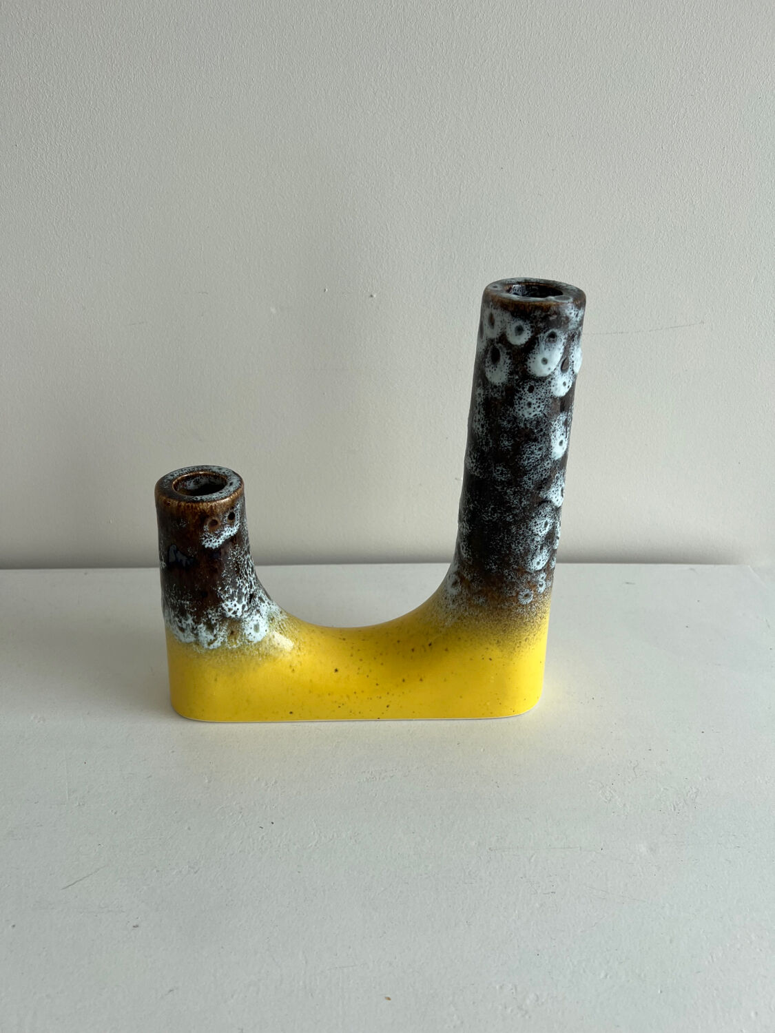 Double asymmetrical candle holder