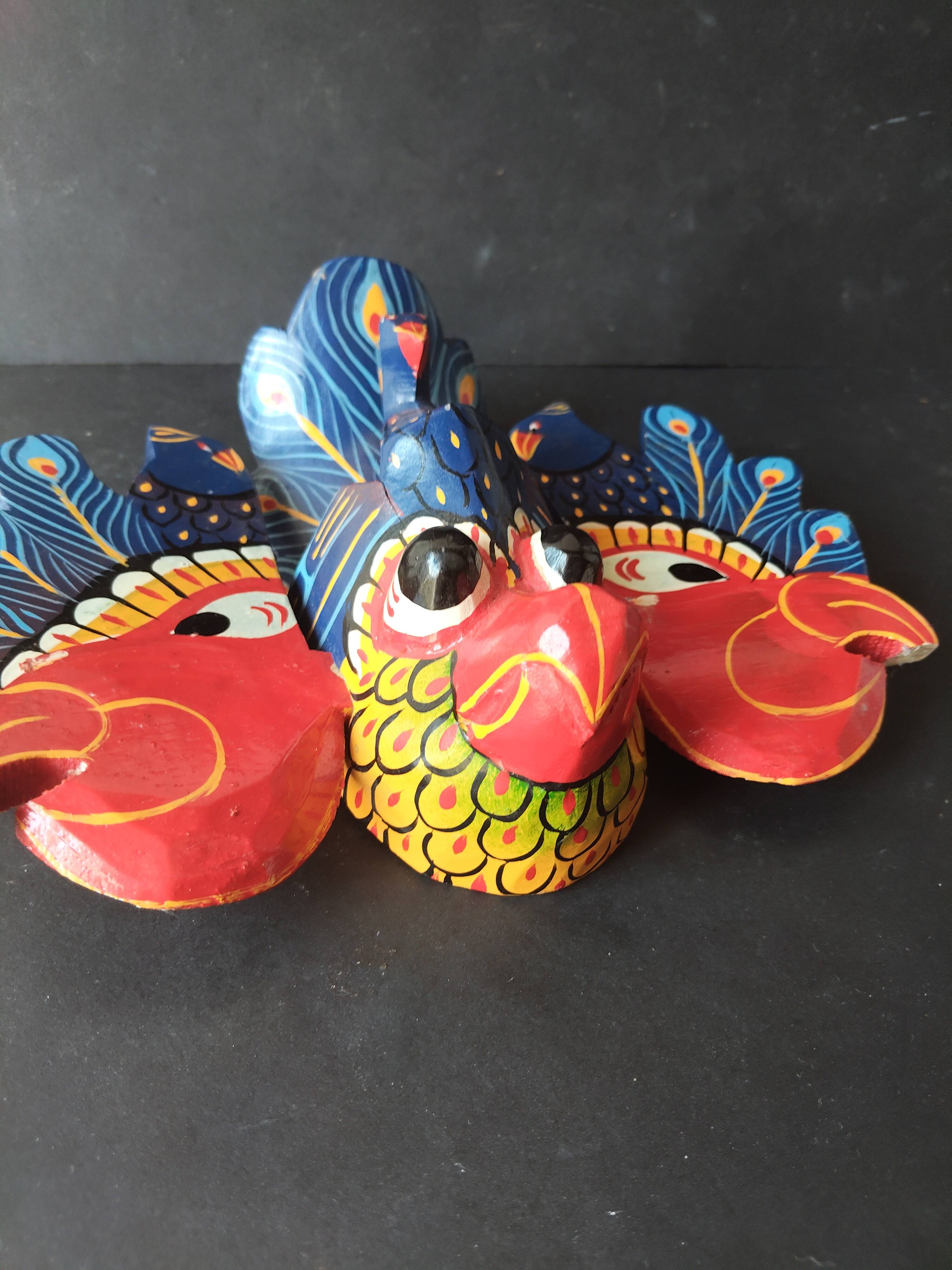 Ancient Balinese mask carved and painted – Stylised peacock – Art p