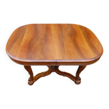 Napoleon III period walnut table from the late 19th century with extensions for 16 covers.