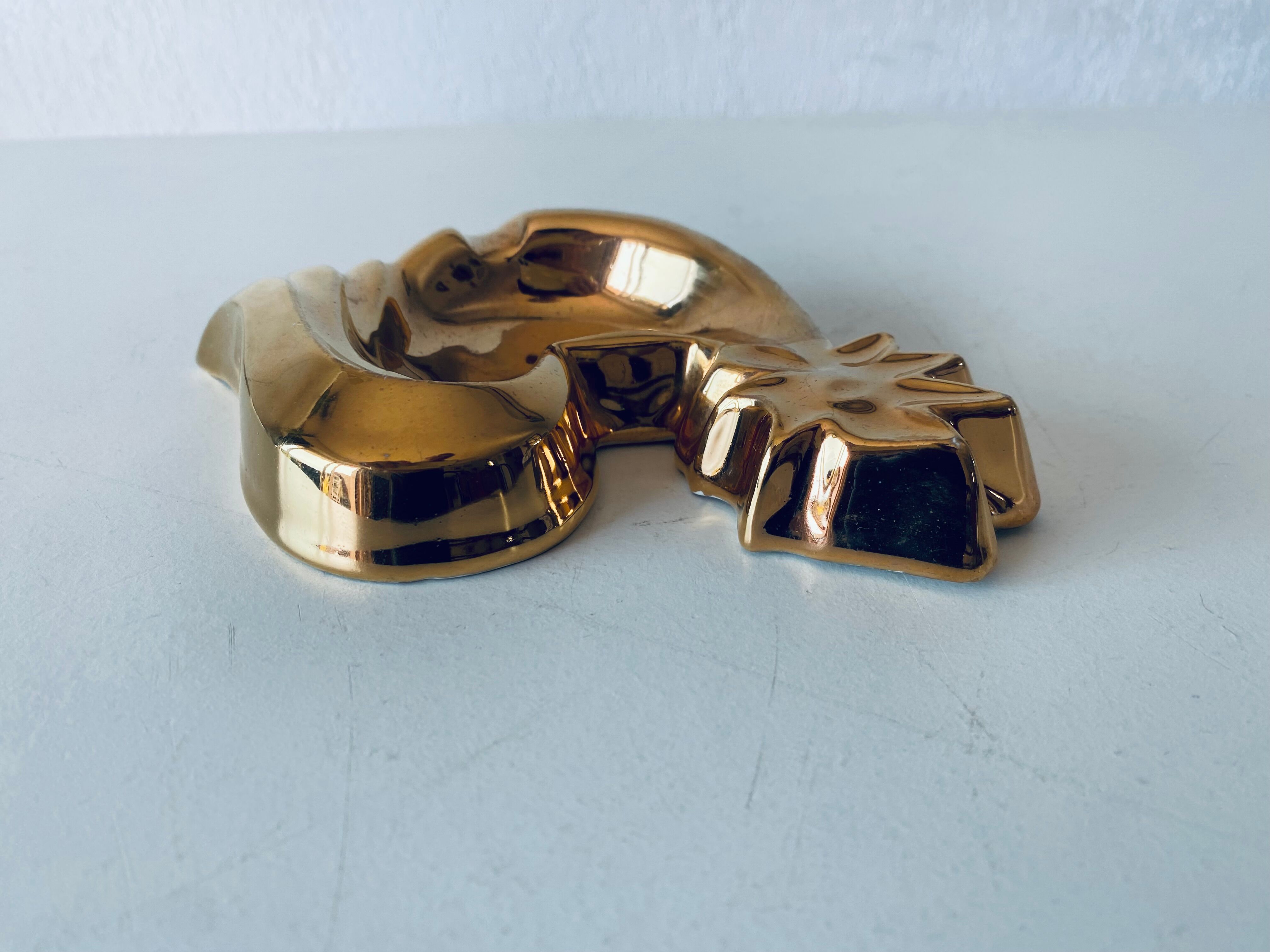 Vintage rooster in gilded ceramic