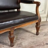 Napoleon III style bench in carved walnut, synthetic leather circa 1880