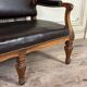 Napoleon III style bench in carved walnut, synthetic leather circa 1880