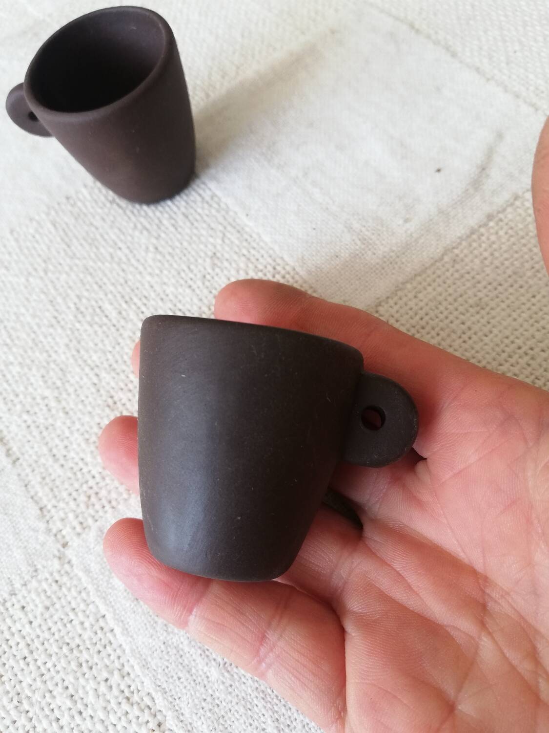 Set of three matte brown ceramic cups for dolls' play kitchen