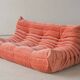 Canapé trois places Togo en velours côtelé corail de Michel Ducaroy pour Ligne Roset