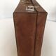 Suitcase of leather with labels of palaces