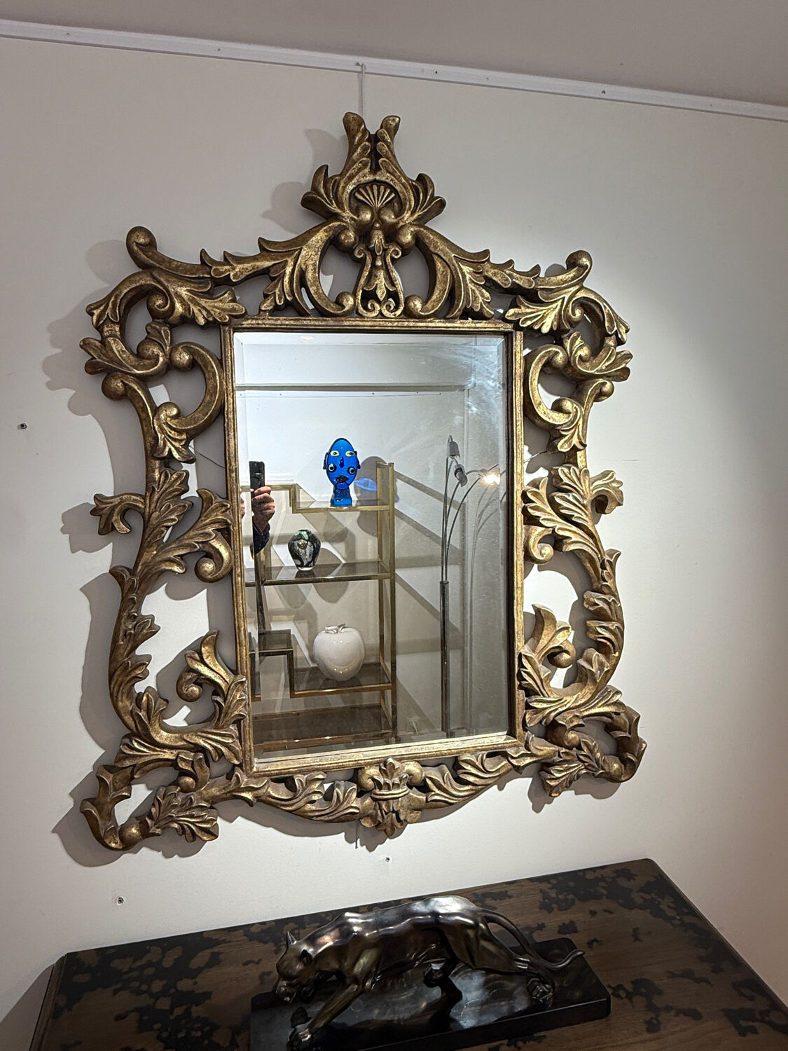 Gold wooden wall mirror with floral decoration