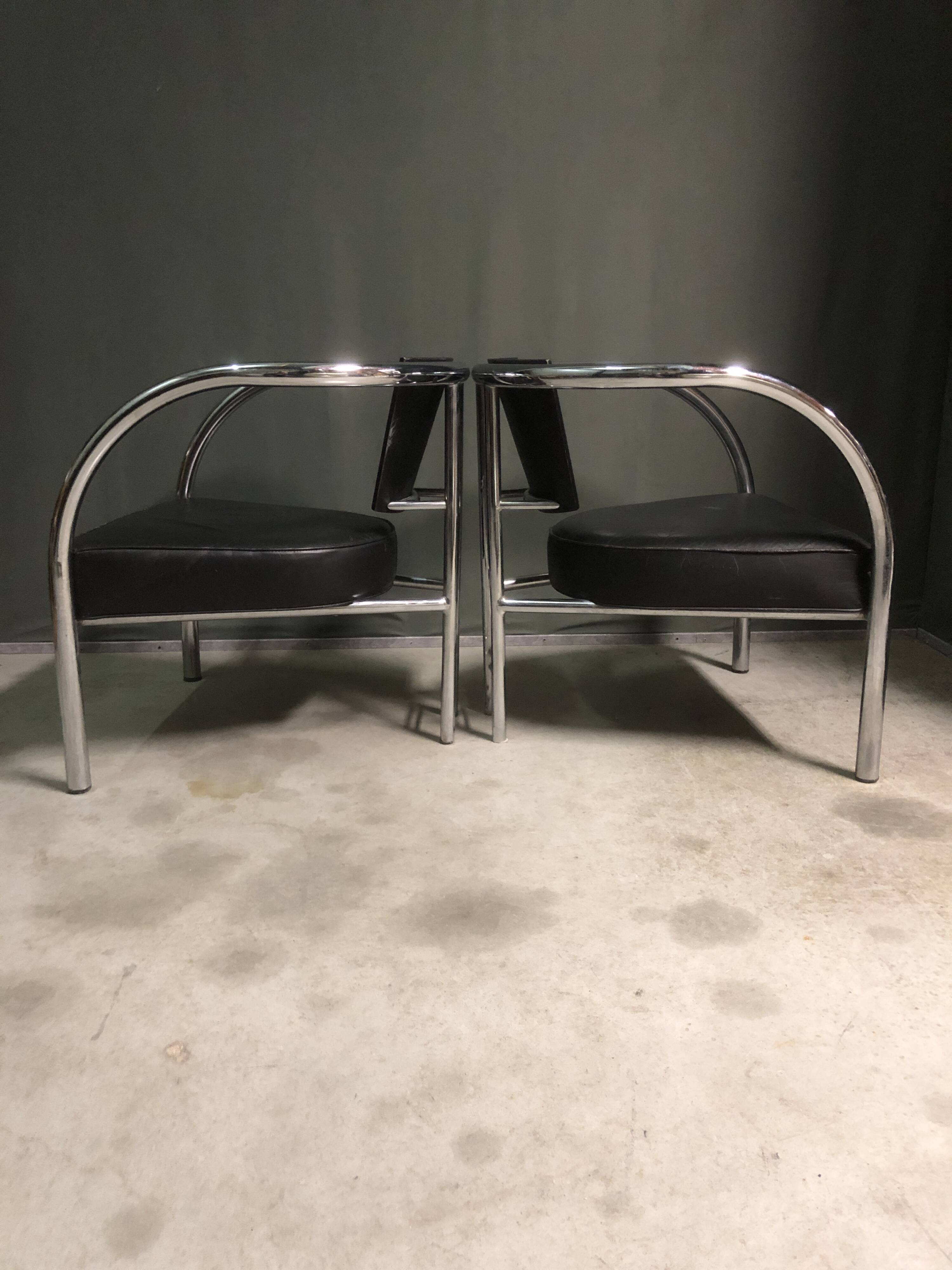A pair of petite low armchairs by ronald cecil sportes for lumen center, 1987