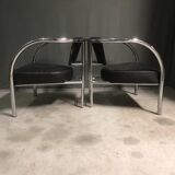 A pair of petite low armchairs by ronald cecil sportes for lumen center, 1987