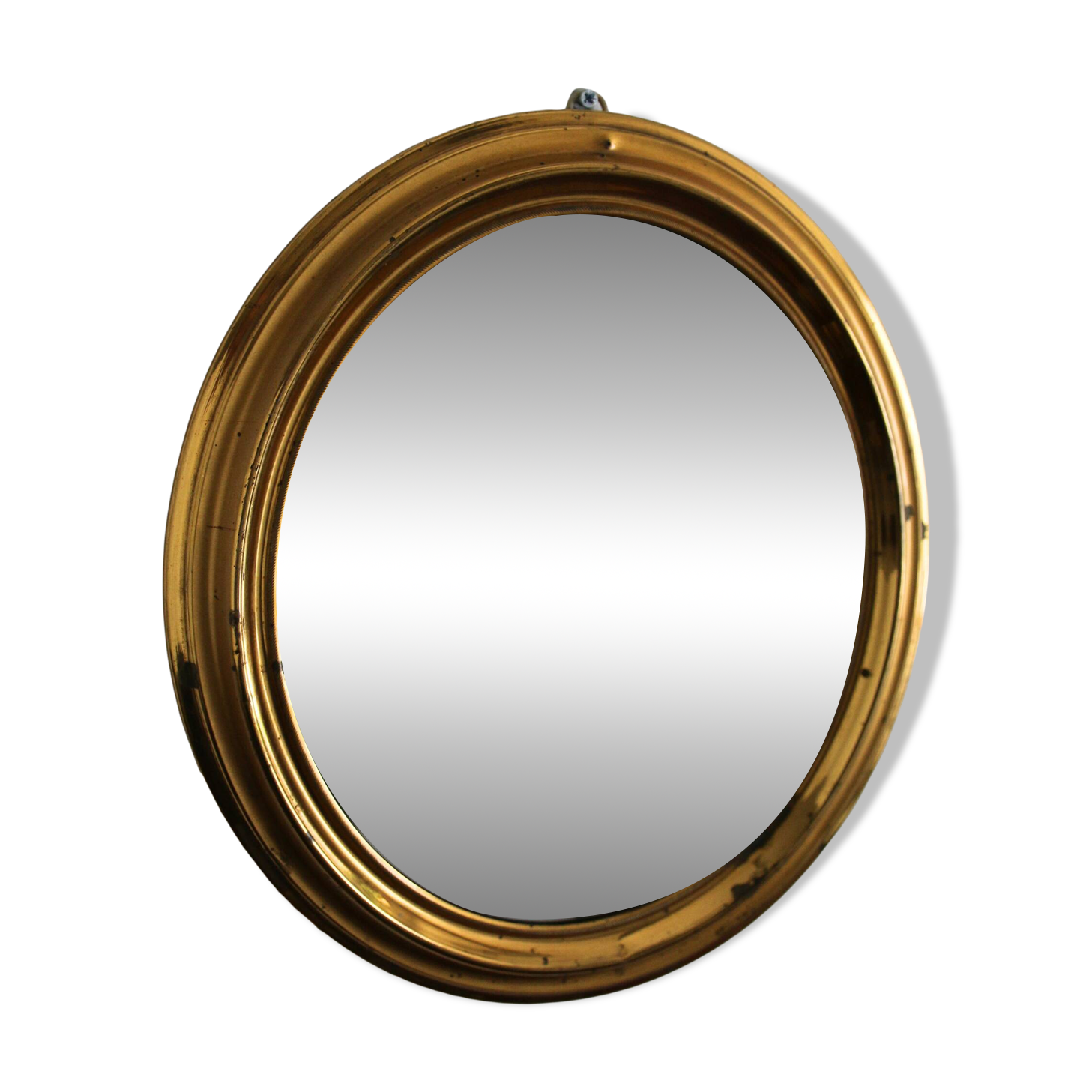 Oval brass mirror