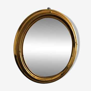 Oval brass mirror