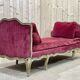 Louis XV style daybed in painted wood and covered with a red velvet