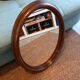 Vintage oval wooden mirror