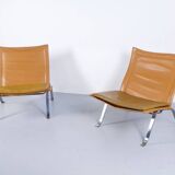 Imposante paire de fauteuils cuir et acier années 60'