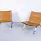 Imposing pair of leather and steel armchairs from the 1960s