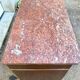 Antique Empire style chest of drawers with marble top